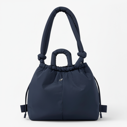 Navy blue quilted puffer bag